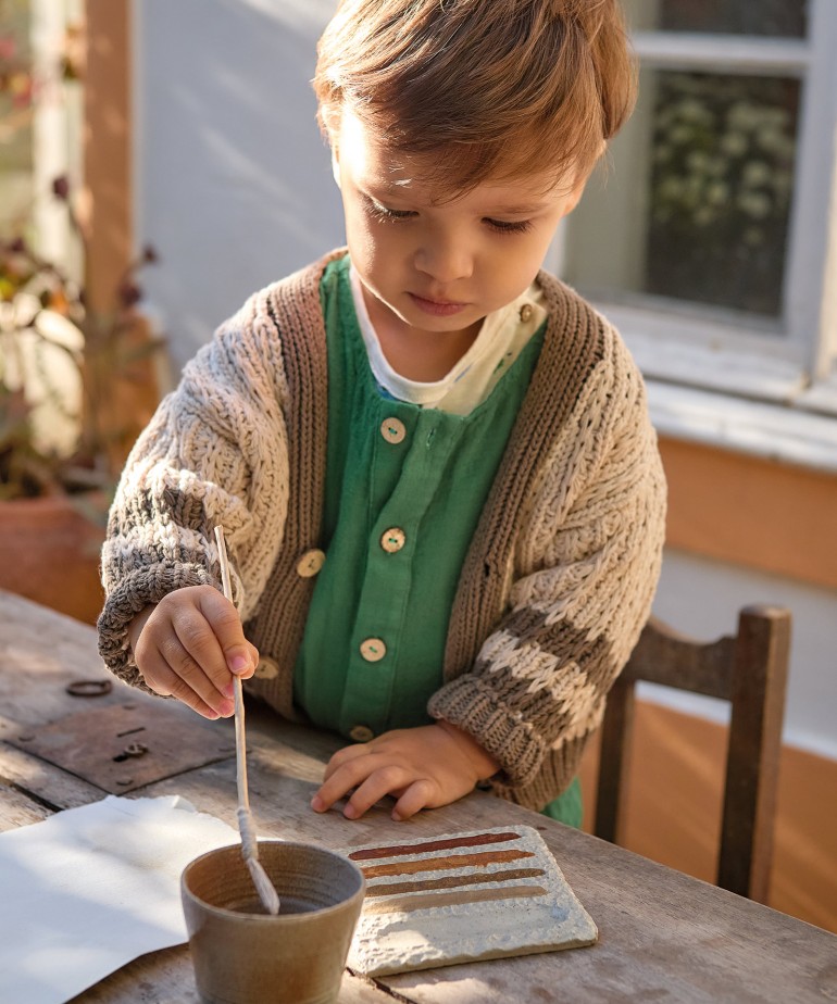 Ceramic palette and cotton brush with watercolors