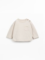 Knit sweater with a blend of natural and recycled fibers