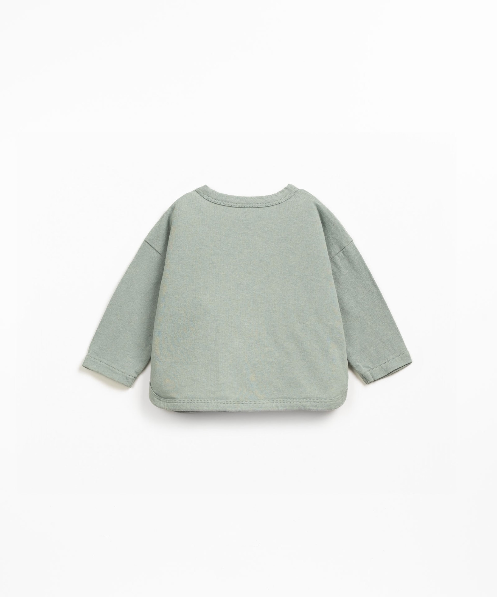 Knit sweater with shoulder opening