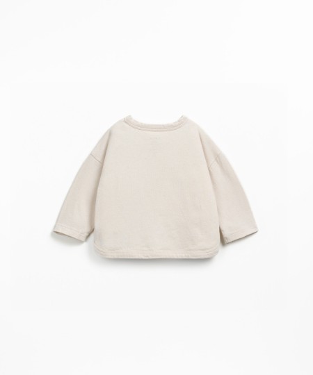 Pull en maille avec un mélange de fibres naturelles et recyclées