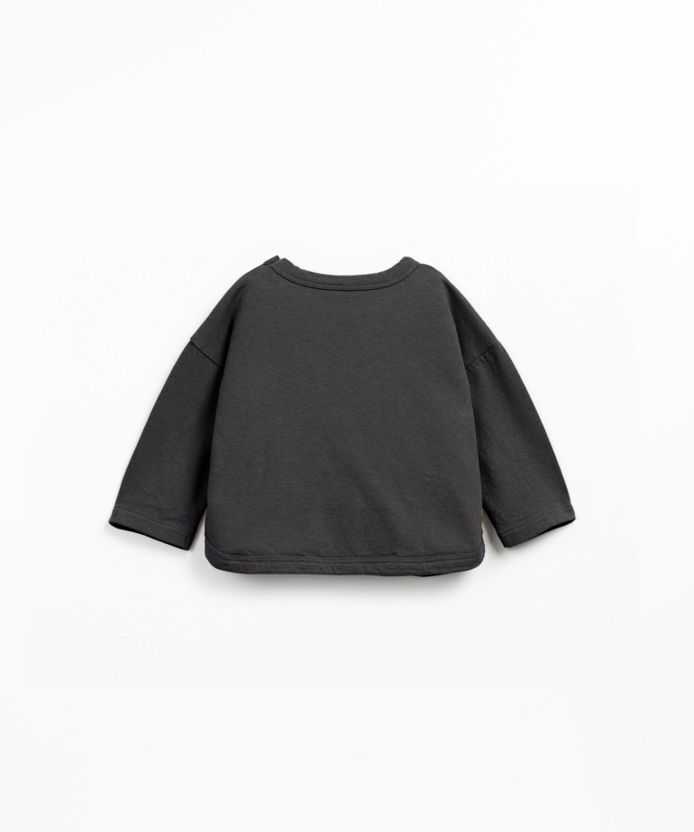 Knit sweater in a blend of natural and recycled fibers