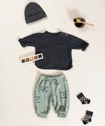 Knit sweater with shoulder opening