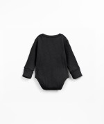 Organic cotton ribbed jersey bodysuit with shoulder opening