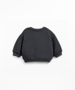 Sweatshirt with shoulder opening