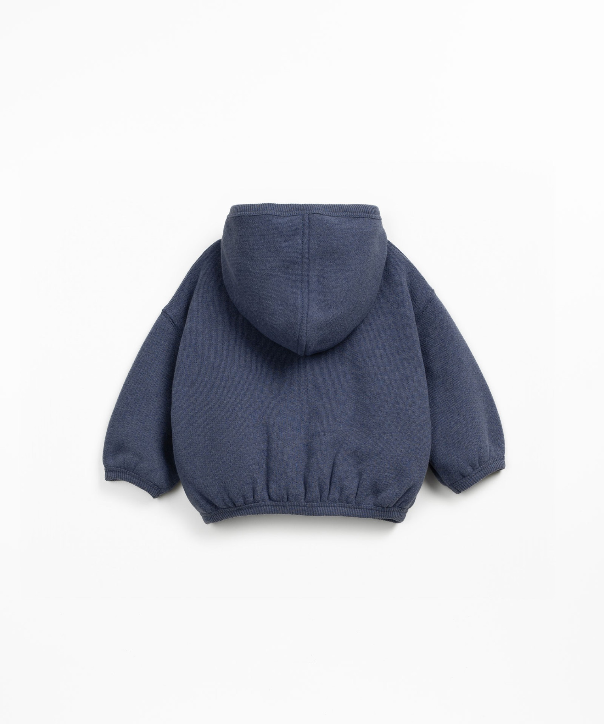 Fleece jacket in recycled cotton with hood, front zipper, and side pockets