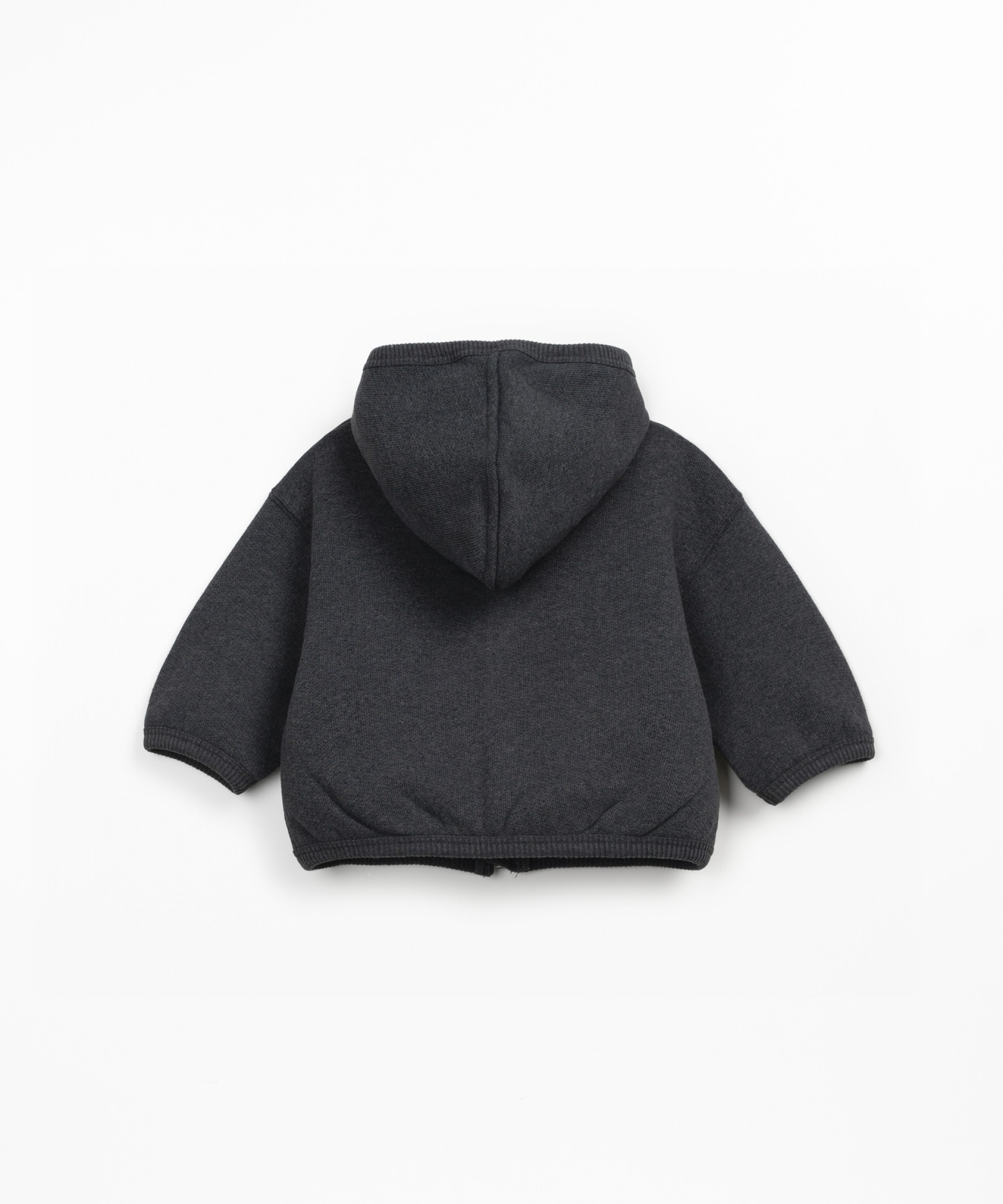Fleece jacket in recycled cotton with hood, front fastening and side pockets