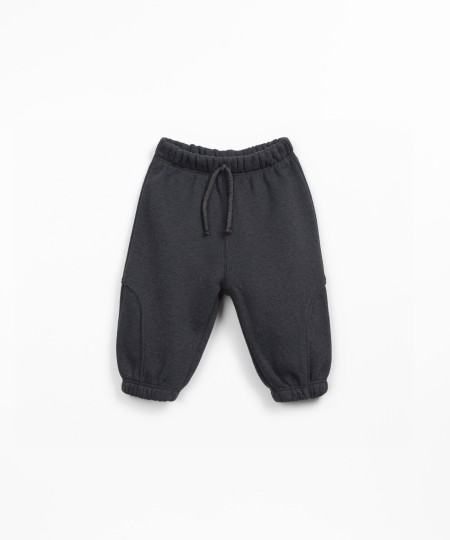 Knit trousers in recycled cotton and recycled polyester blend
