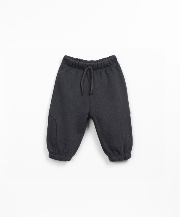 Knit trousers in recycled cotton and recycled polyester blend
