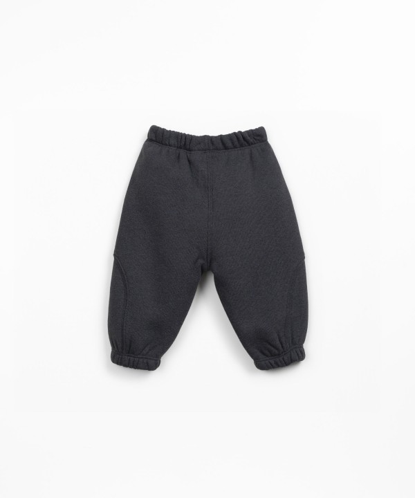 Knit trousers in recycled cotton and recycled polyester blend