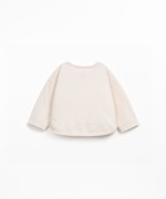 T-shirt with front design and shoulder opening