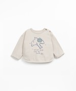 T-shirt with front print and shoulder opening