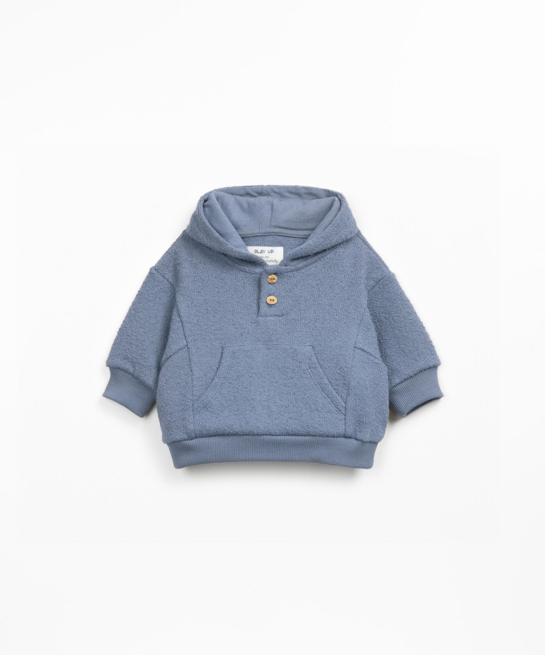 Knit sweater with organic and regenerative cotton