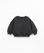 Knitted sweater with chest pocket
