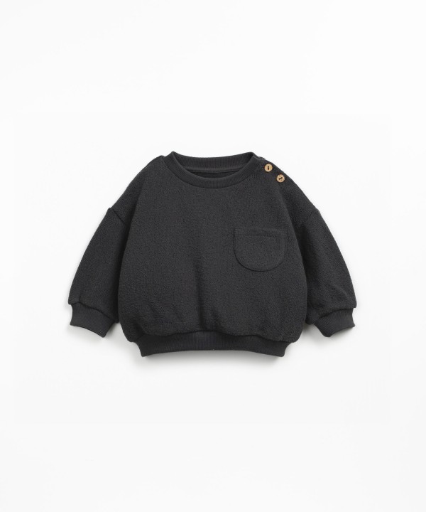 Knitted sweater in a blend of organic cotton and regenerative cotton