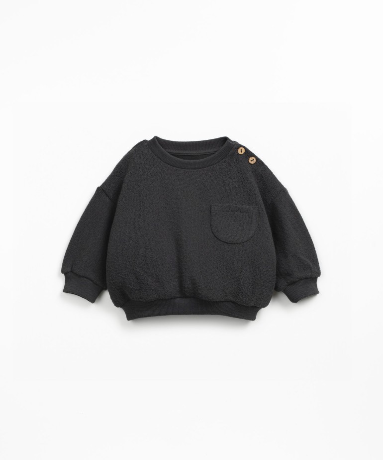 Knitted sweater in a blend of organic cotton and regenerative cotton