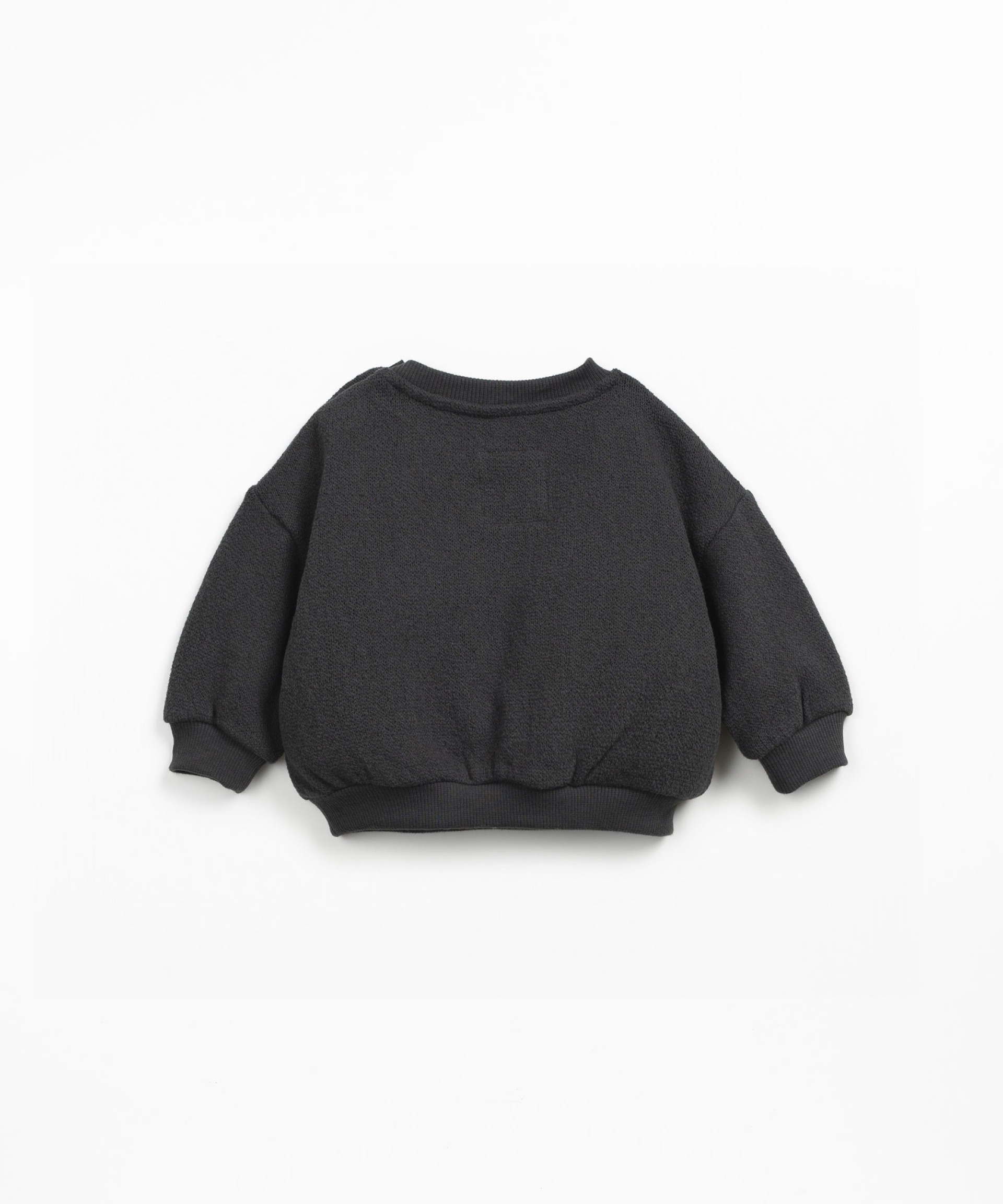 Knitted sweater with chest pocket