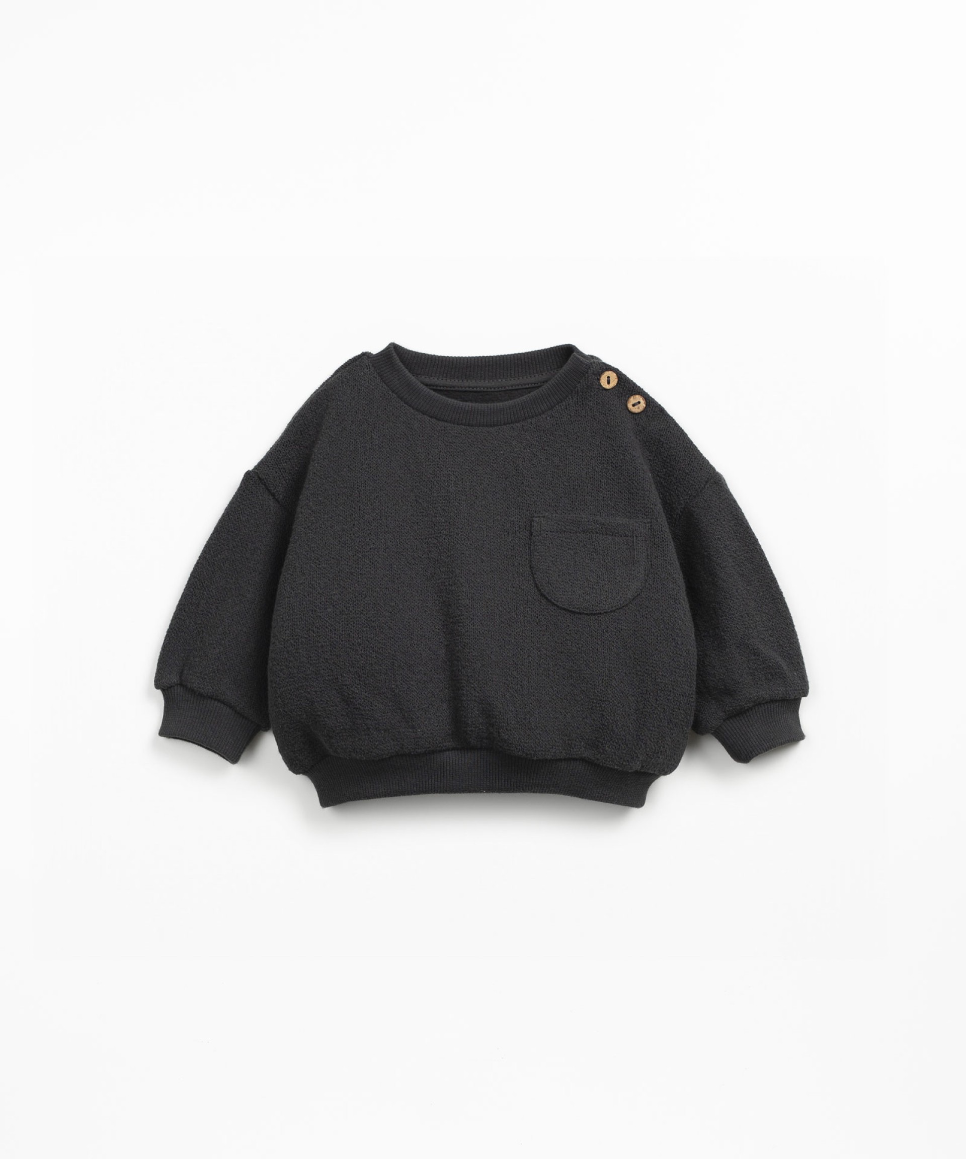 Knitted sweater with chest pocket