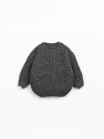 Knit sweater with recycled fibers
