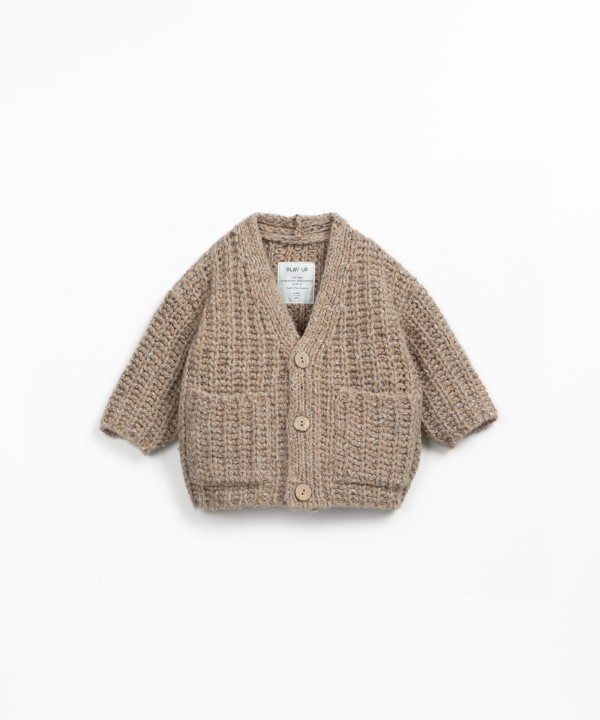 Knitted coat with recycled wool and wool blend