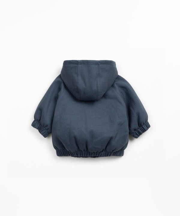 Waterproof twill jacket with faux fur lining