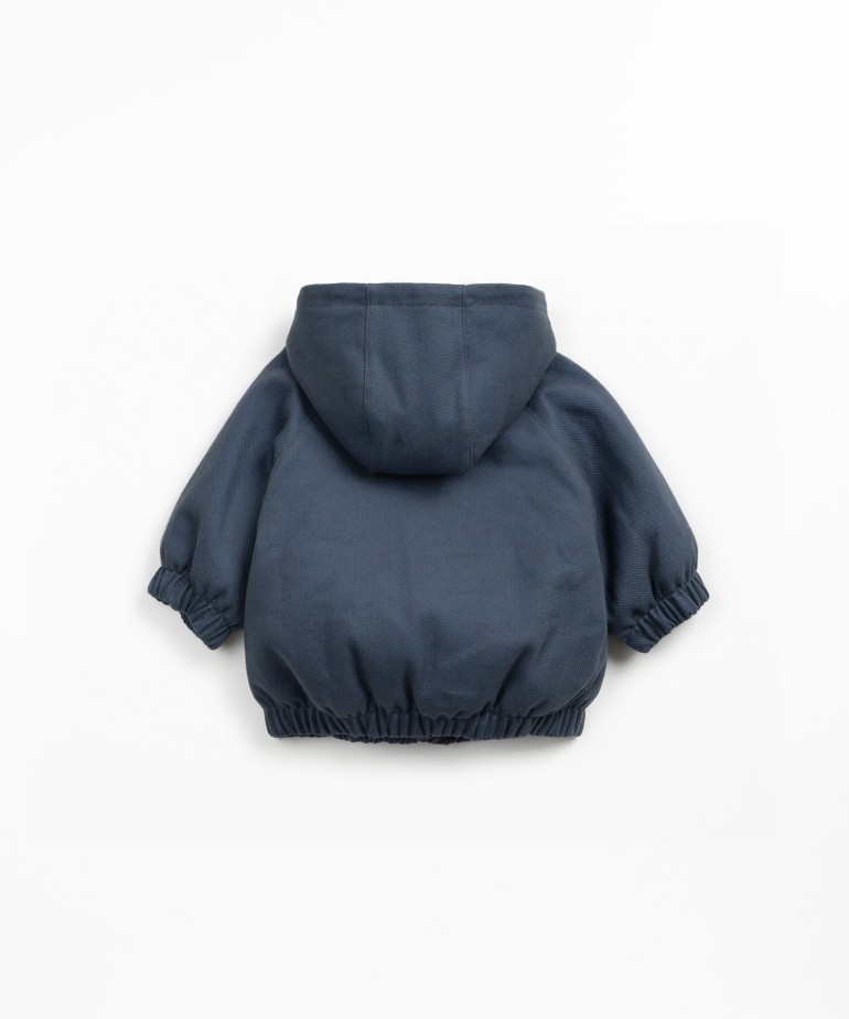 Waterproof twill jacket with faux fur lining