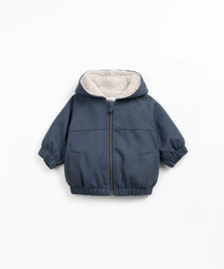 Waterproof twill jacket with faux fur lining