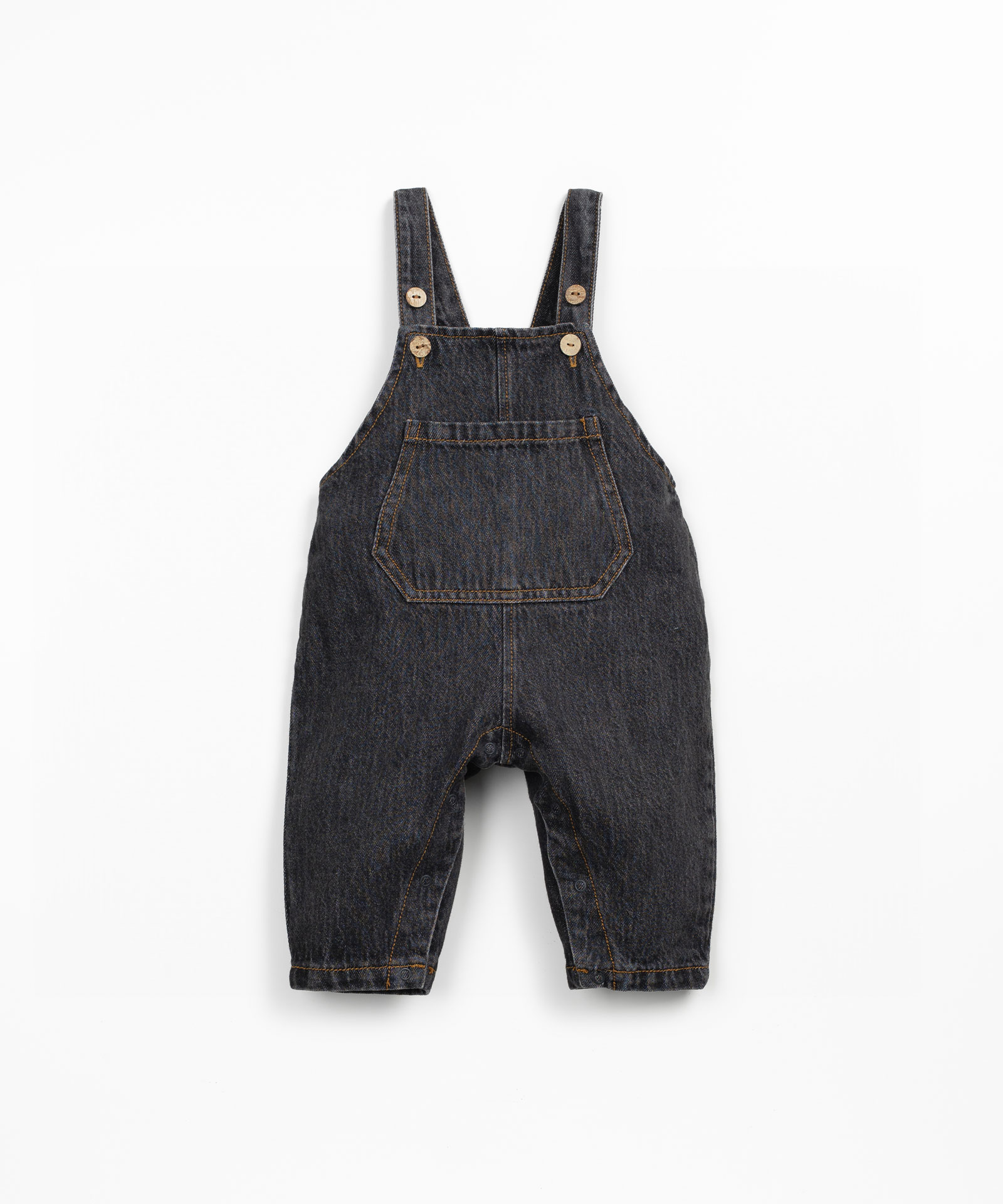 Salopette in denim con tasca frontale