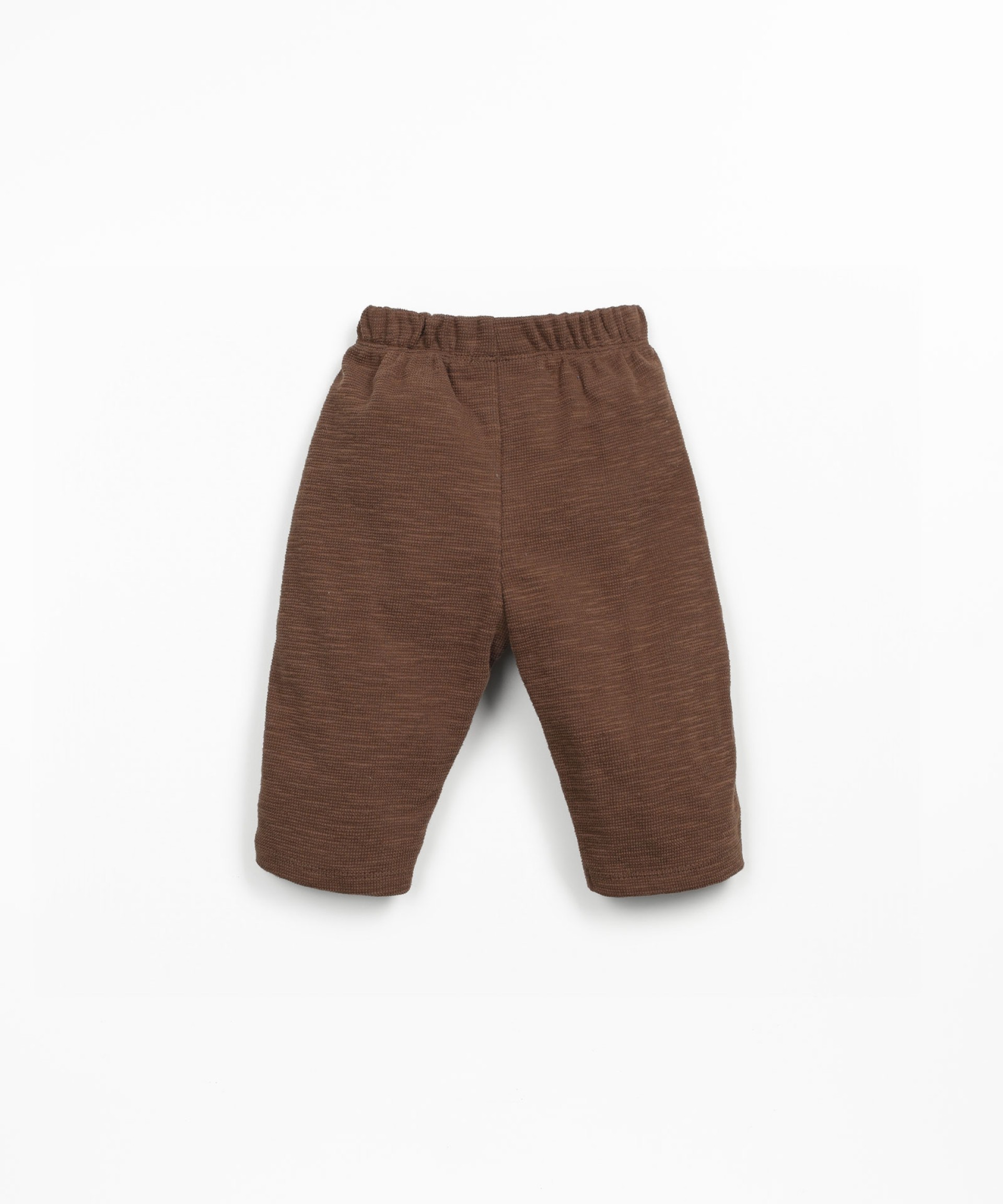 Jersey pants with decorative drawstring