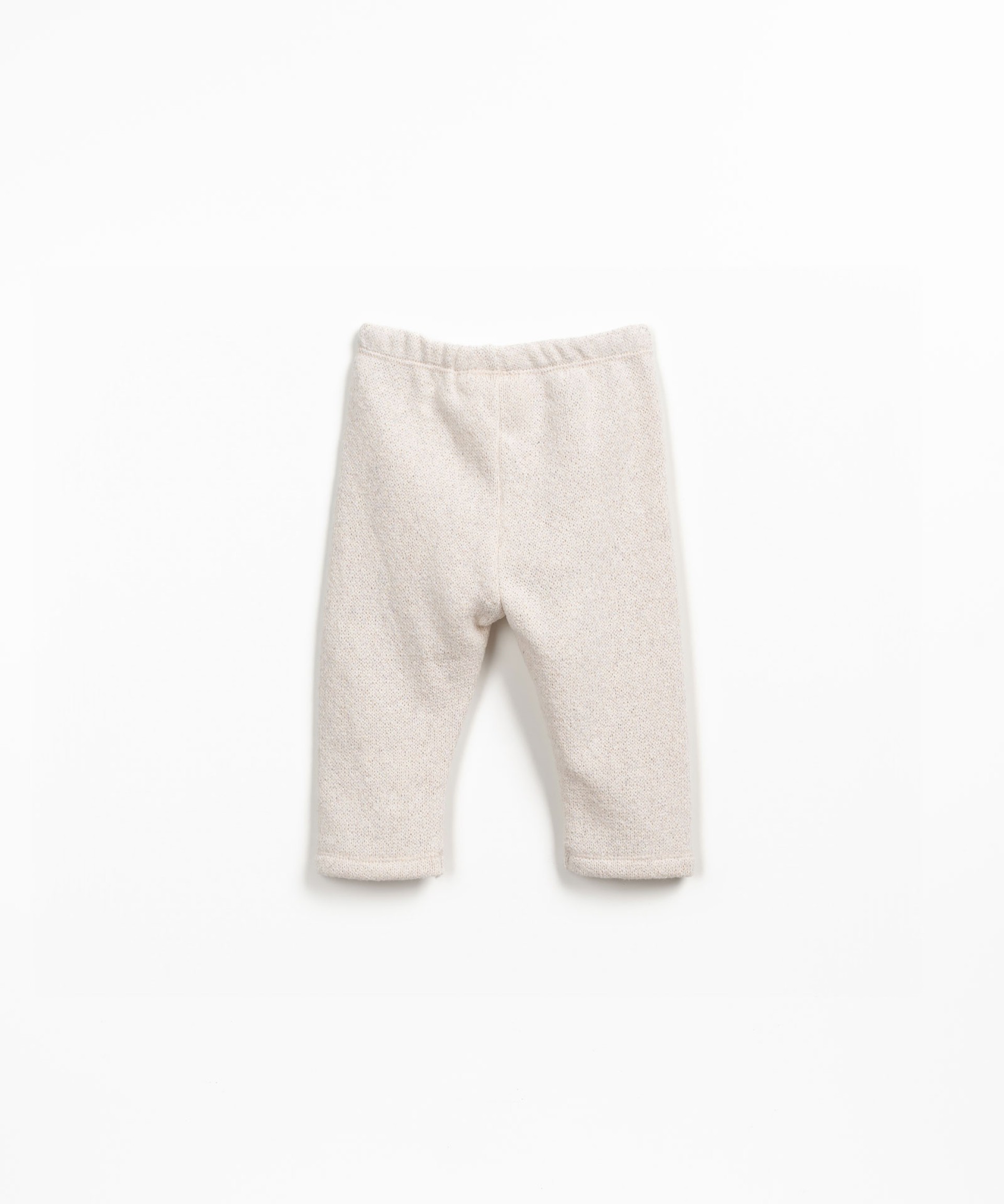 Knit leggings with decorative coconut button