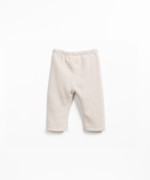 Knit leggings with decorative coconut button