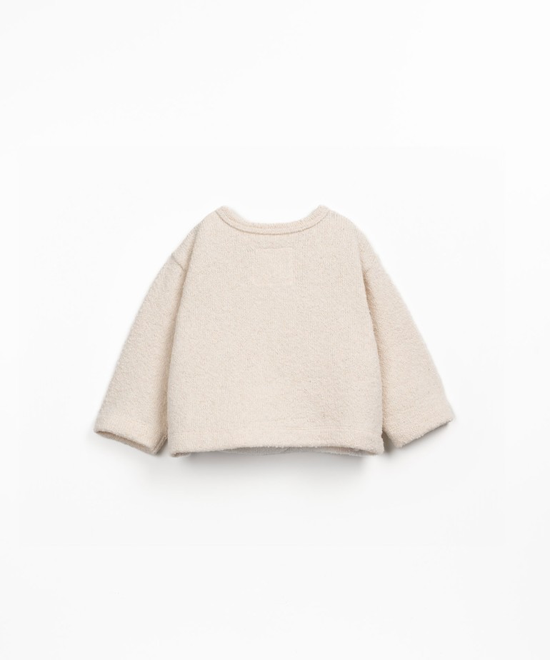 Knit cardigan with Re(play) yarn