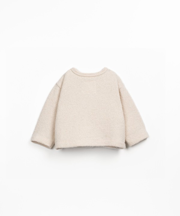 Knit cardigan with Re(play) yarn