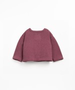 Knitted jacket with a blend of natural and recycled fibers