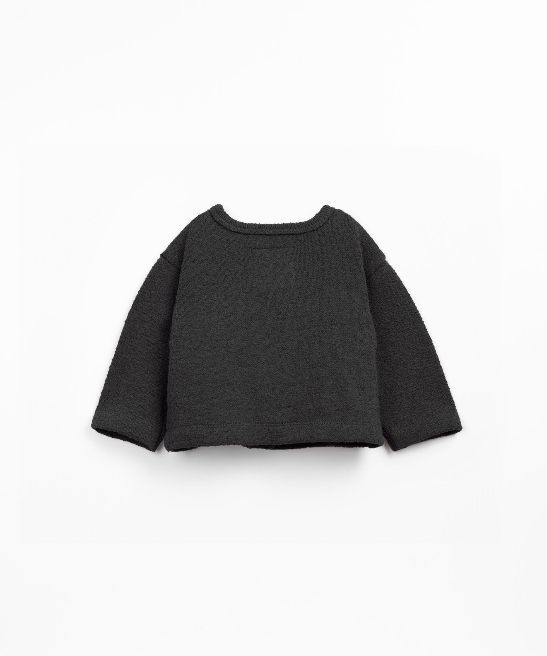 Knit jacket made with a blend of natural fibers and recycled fibers