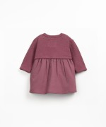 Dress with shoulder opening