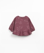 Tunic with ruffle insert