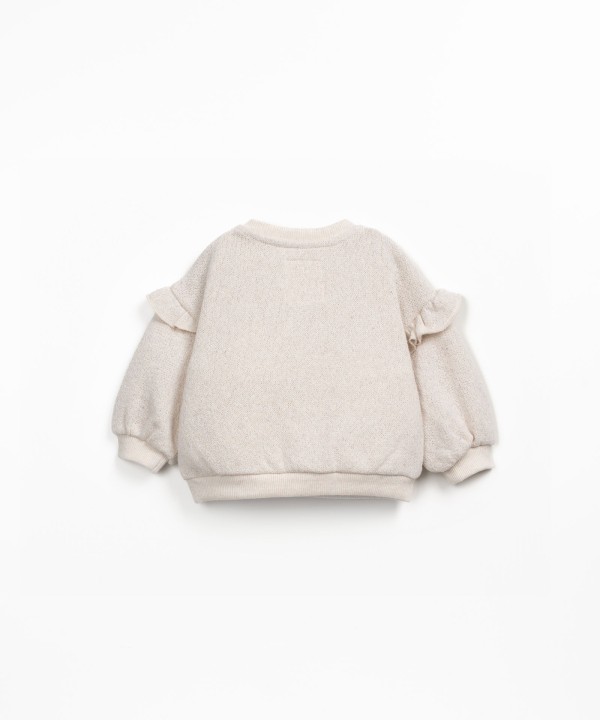 Felpa con volant sulla spalla