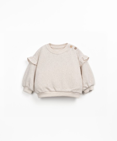 Sudadera con volante en el hombro