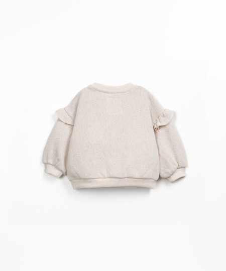 Sudadera con volante en el hombro