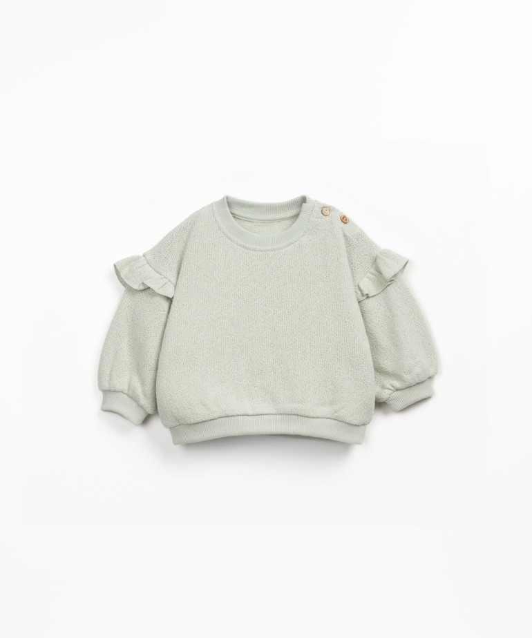 Sweatshirt with shoulder ruffle