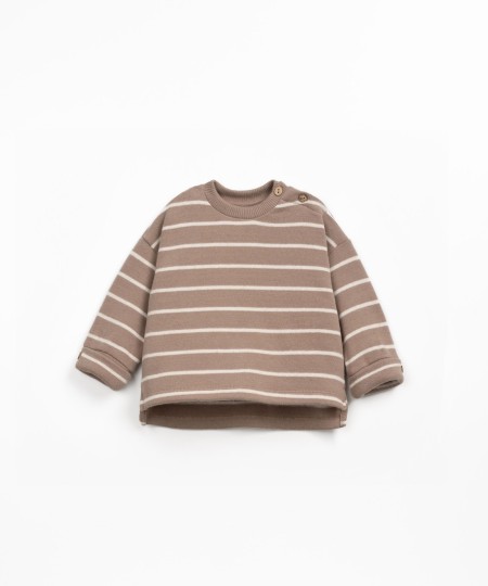 Maglia a righe con apertura sulla spalla