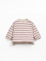 Pull ray� avec ouverture � l'�paule