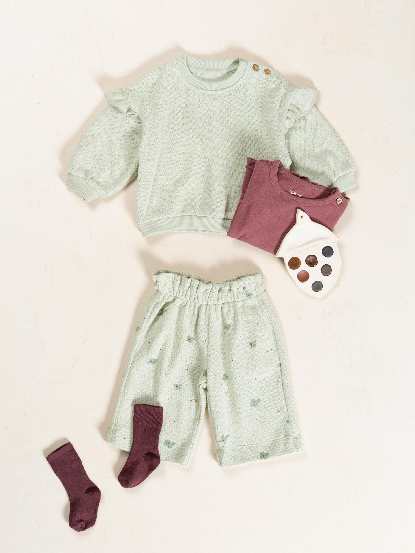 Felpa con volant sulla spalla