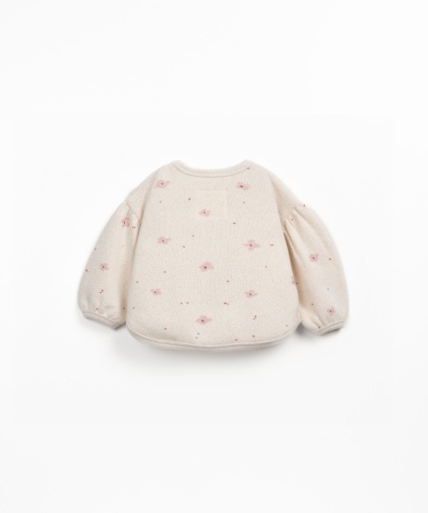 Knitted sweater with a blend of regenerative cotton and recycled cotton