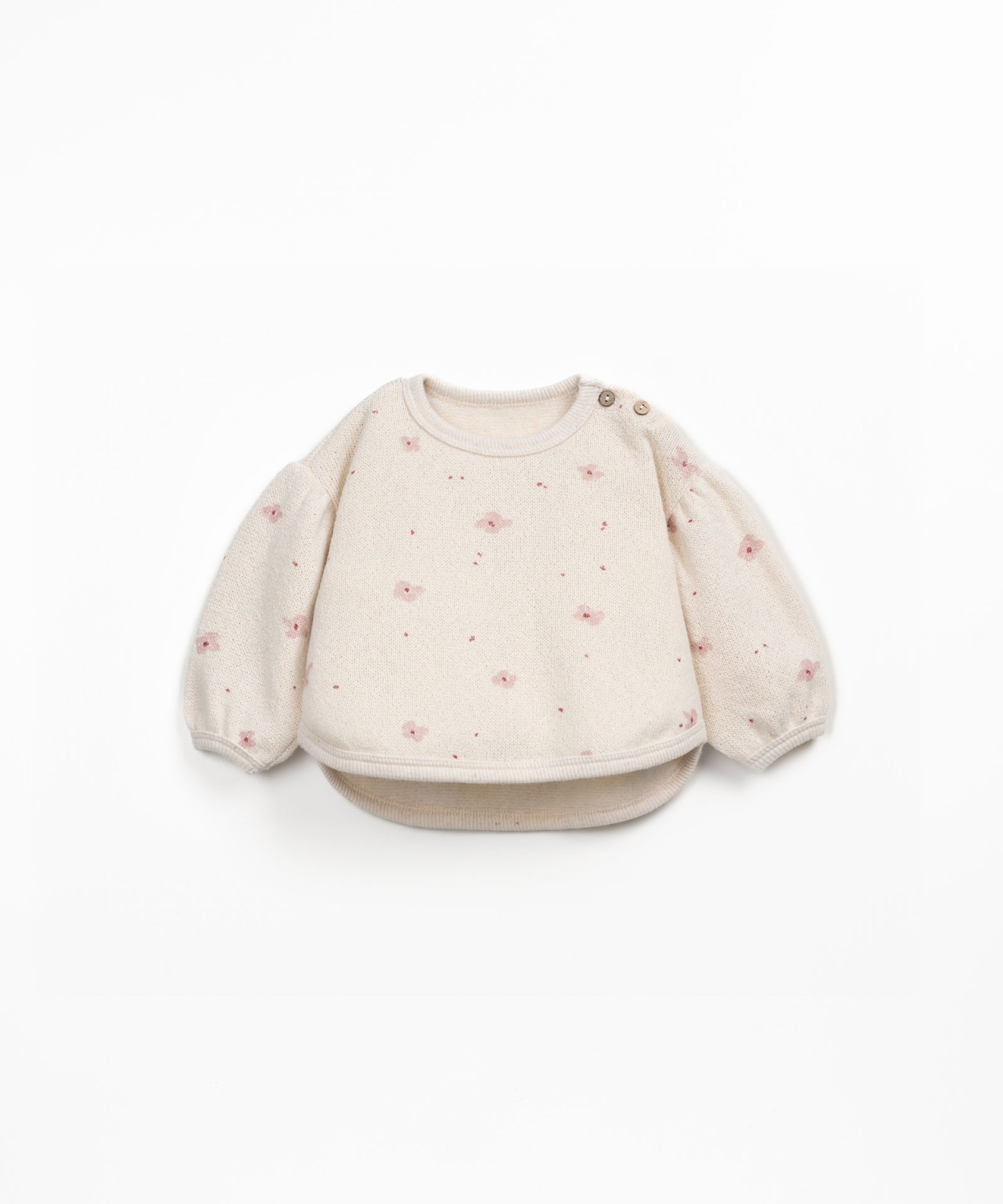 Sweater with rounded cut