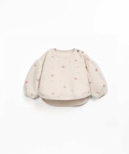 Knitted sweater with a blend of regenerative cotton and recycled cotton