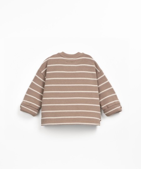 Maglia a righe con apertura sulla spalla