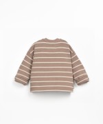 Knit sweater made from a blend of regenerative cotton and organic cotton