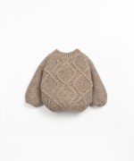 Knit sweater made from a blend of recycled wool, wool and viscose
