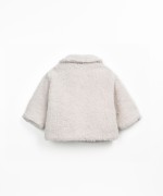 Fur coat with printed lining